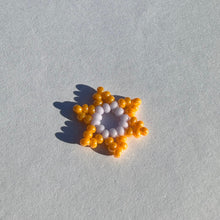 Load image into Gallery viewer, pearlized orange and lavender seed bead flower pendant
