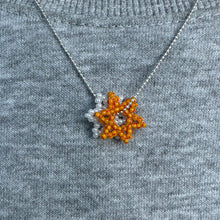 Load image into Gallery viewer, orange and red striped seed bead flower pendant on sterling silver curb chain
