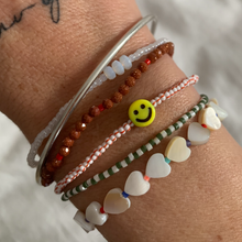 Load image into Gallery viewer, shell heart bead and multi colored seed bead stretchy bracelet