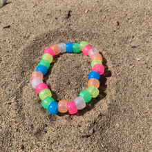 Load image into Gallery viewer, fun multi colored plastic pony bead glow in the dark stretchy bracelet 
