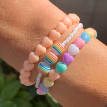 Load image into Gallery viewer, light peach heart bead stretchy bracelet

