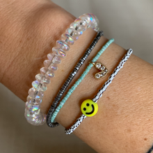 Load image into Gallery viewer, green and white striped seed bead bracelet with a gold plated heart charm with clear cz crystal stones