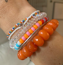 Load image into Gallery viewer, faceted orange glass bead stretch bracelet
