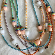 Load image into Gallery viewer, multi colored seed bead necklace with sterling silver stardust beads, gold filled star and round beads and heart, striped and iridescent beads