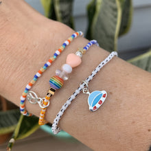 Load image into Gallery viewer, purple, luster white and yellow with red stripes seed bead bracelet with iridescent, shell, peach heart and sterling silver stardust beads with a sterling silver peace sign charm and UFO bracelet