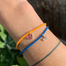 Load image into Gallery viewer, orange and blue seed bead bracelet with a gold plated heart charm with clear cz crystal stones