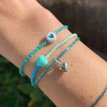 Load image into Gallery viewer, green, blue, white seed bead bracelet with a cute heart bead and sterling silver heart bracelet
