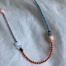 Load image into Gallery viewer, multi colored seed bead necklace with sterling silver stardust beads, gold filled star and round beads and heart, striped and iridescent beads