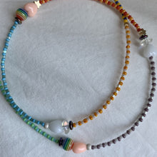 Load image into Gallery viewer, multi colored seed bead necklace with sterling silver stardust beads, gold filled star and round beads and heart, striped and iridescent beads