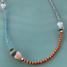 Load image into Gallery viewer, multi colored seed bead necklace with sterling silver stardust beads, gold filled star and round beads and heart, striped and iridescent beads