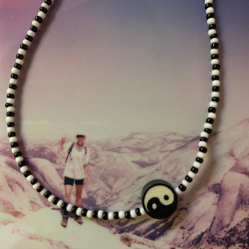 black and white seed bead and yin yang necklace with sterling silver clasp
