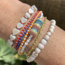 Load image into Gallery viewer, shell heart bead and multi colored seed bead stretchy bracelet