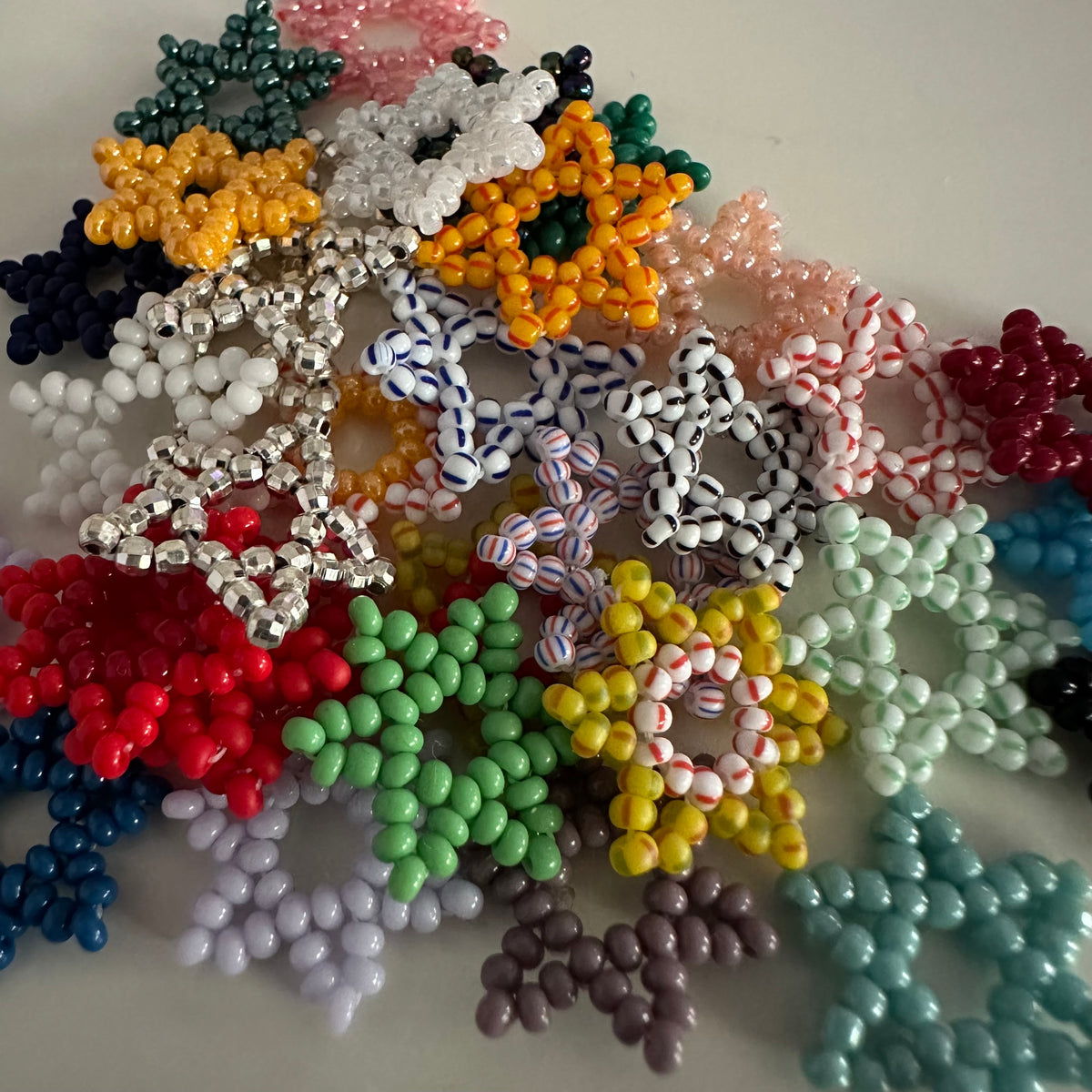 beaded colorful necklace, bracelet, hoop earring pendants bryn