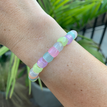 Load image into Gallery viewer, multi colored pastel glow in the dark plastic pony bead stretchy bracelet 
