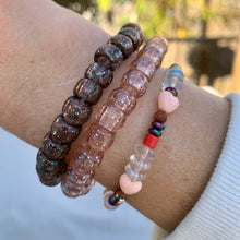 Load image into Gallery viewer, peach hearts, sparkly sandstone, purple iridescent, clear iridescent and colored tube beaded stretch  bracelet and glitter bracelets
