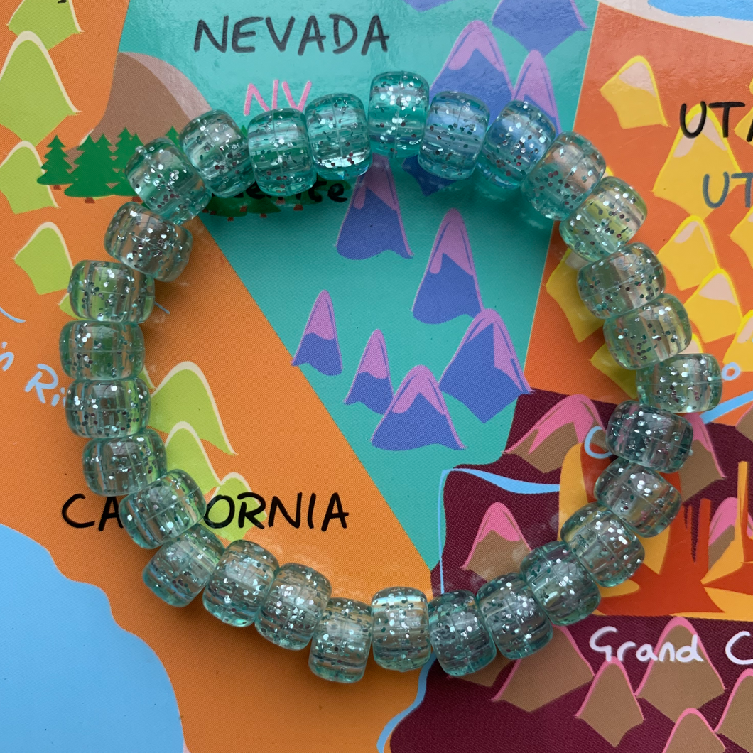 mint green glitter plastic pony bead stretchy bracelet