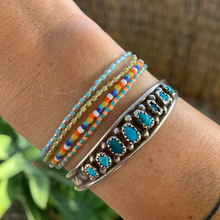 Load image into Gallery viewer, turquoise, blue, white, orange and yellow seed bead elastic bracelet
