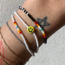 Load image into Gallery viewer, white black red orange yellow green blue smiley face seed bead bracelet set
