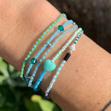 Load image into Gallery viewer, green, blue, white seed bead bracelet with a cute heart bead and Swarovski crystal bead and sterling silver bracelet
