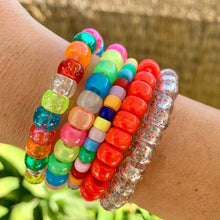 Load image into Gallery viewer, multi colored plastic glitter pony bead stretchy bracelet 
