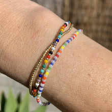 Load image into Gallery viewer, pearly and rainbow colored beaded elastic bracelet, red, orange, yellow, green, blue, purple
