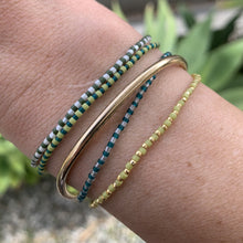 Load image into Gallery viewer, dark green and cream luster seed bead stretch bracelet
