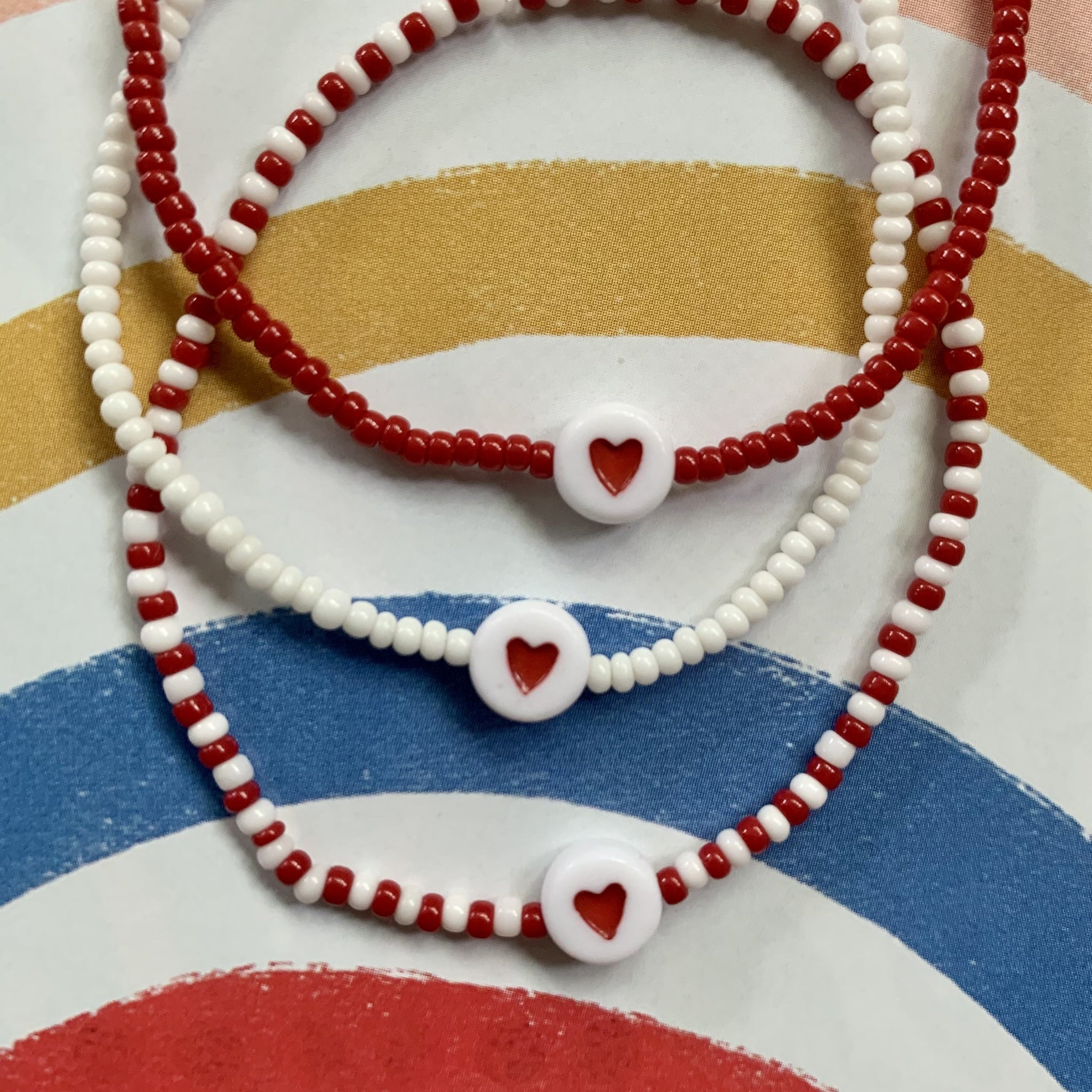 xoxo red and white seed bead heart stretchy bracelet – bryn sanders jewelry