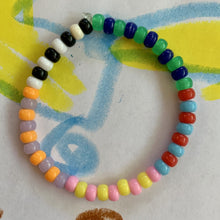 Load image into Gallery viewer, multi colored, patterned plastic mini pony bead stretchy braceletmulti colored, patterned plastic mini pony bead stretchy bracelet
