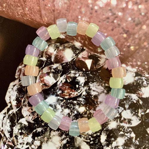 multi colored pastel glow in the dark plastic pony bead stretchy bracelet 