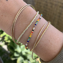 Load image into Gallery viewer, aspen gold seed bead stretch bracelet and gold rainbow stretch bracelets
