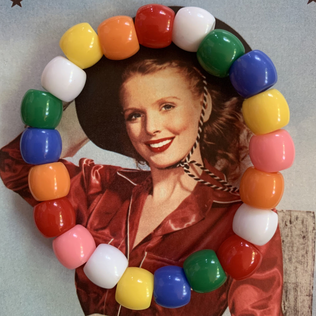 multi colored patterned big pony bead stretch bracelet