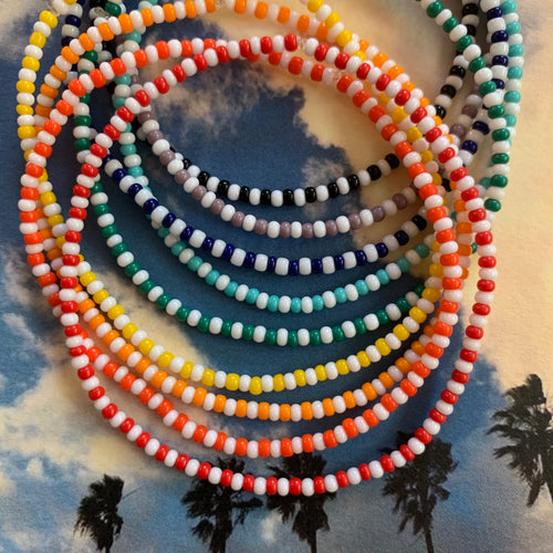 colored and white seed bead striped bracelets
