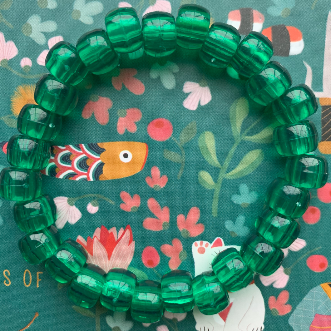 emerald colored plastic pony bead stretchy bracelet