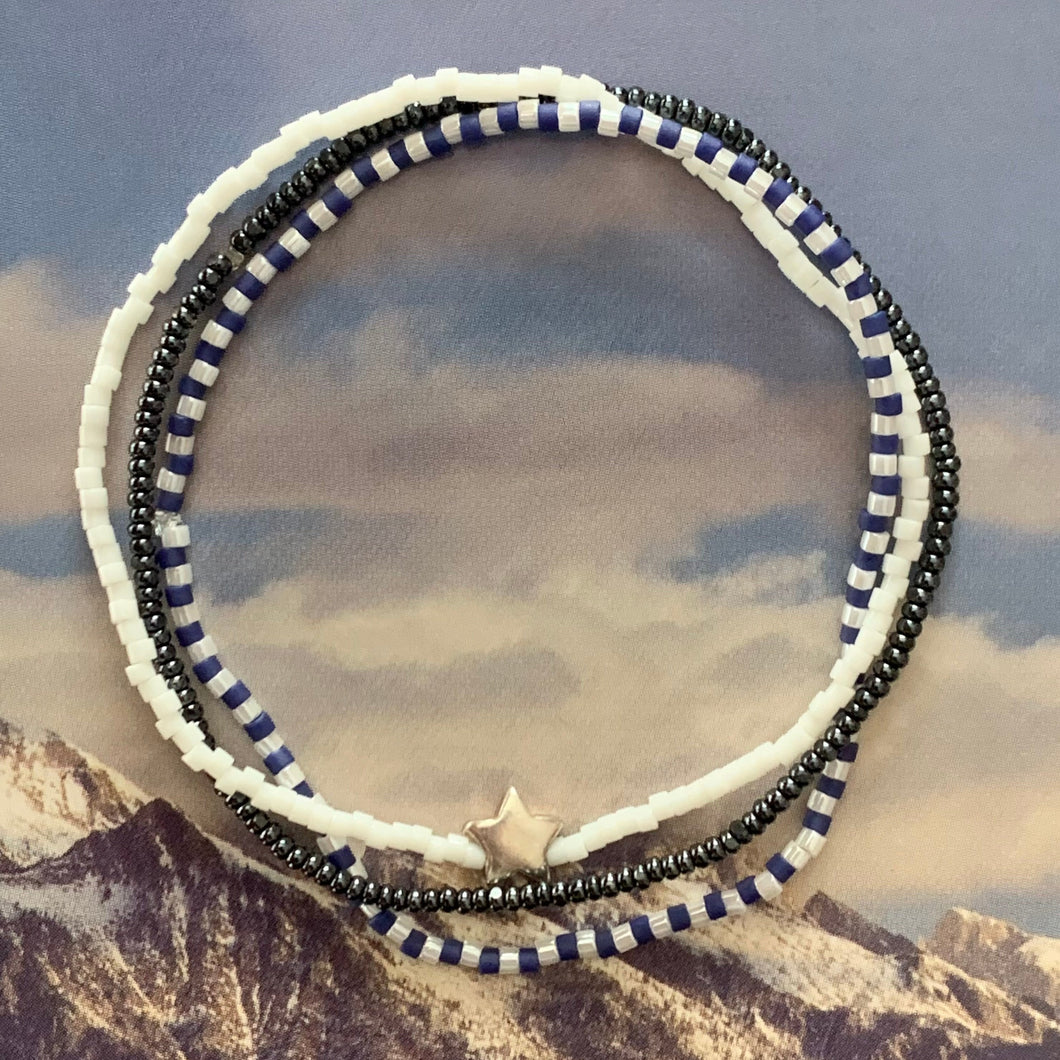 white, faceted black, blue sterling silver star elastic bracelet set
