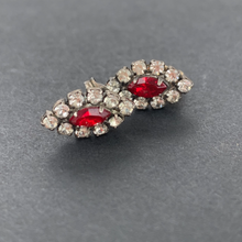 Load image into Gallery viewer, vintage red stone earrings surrounded by faux diamond rhinestones in an eye shape
