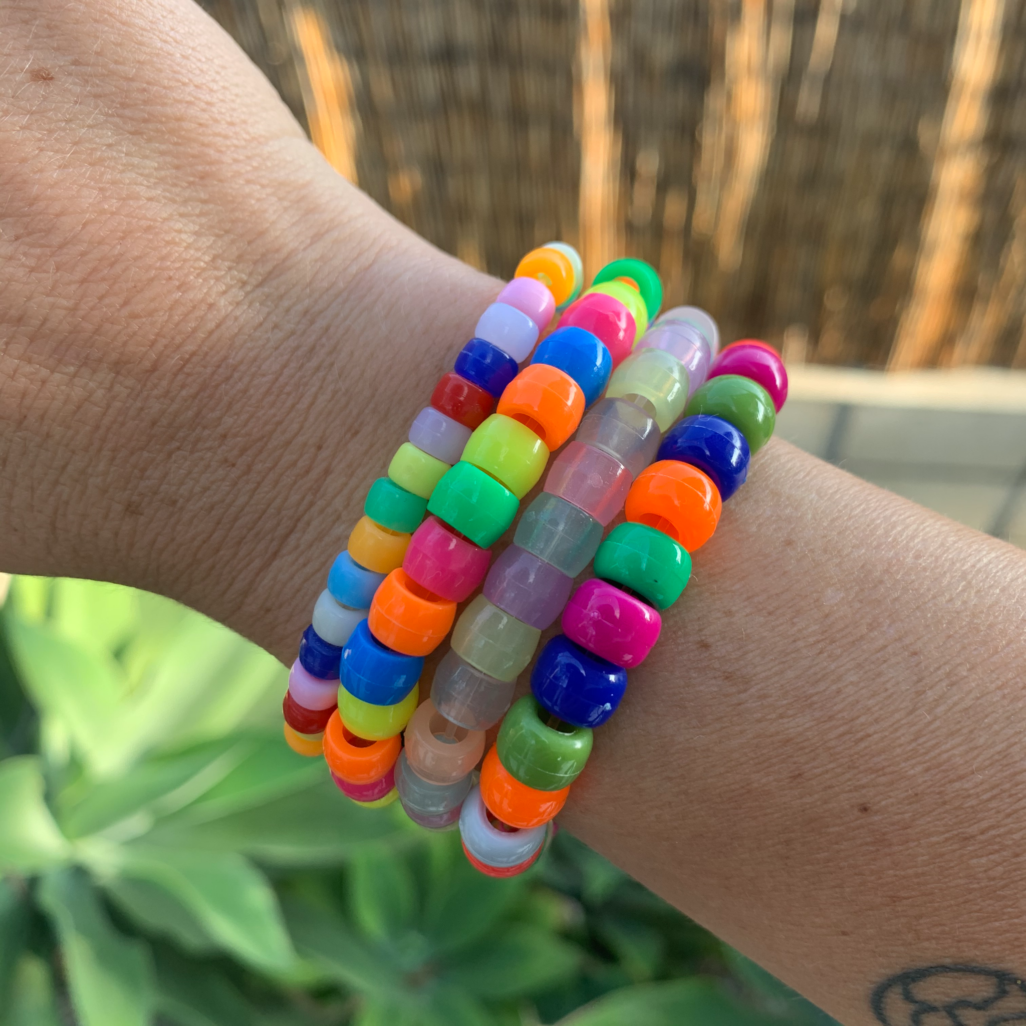 multi colored neon glow in dark pony bead bracelet – bryn sanders