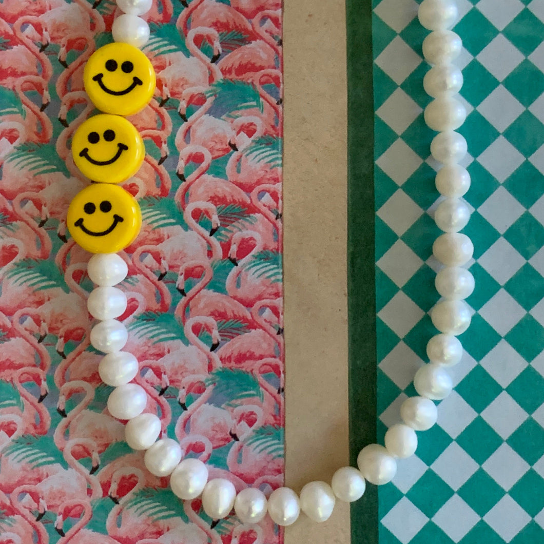 pearl and yellow smiley  face necklace