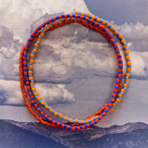 orange, blue, red seed bead striped elastic bracelet set